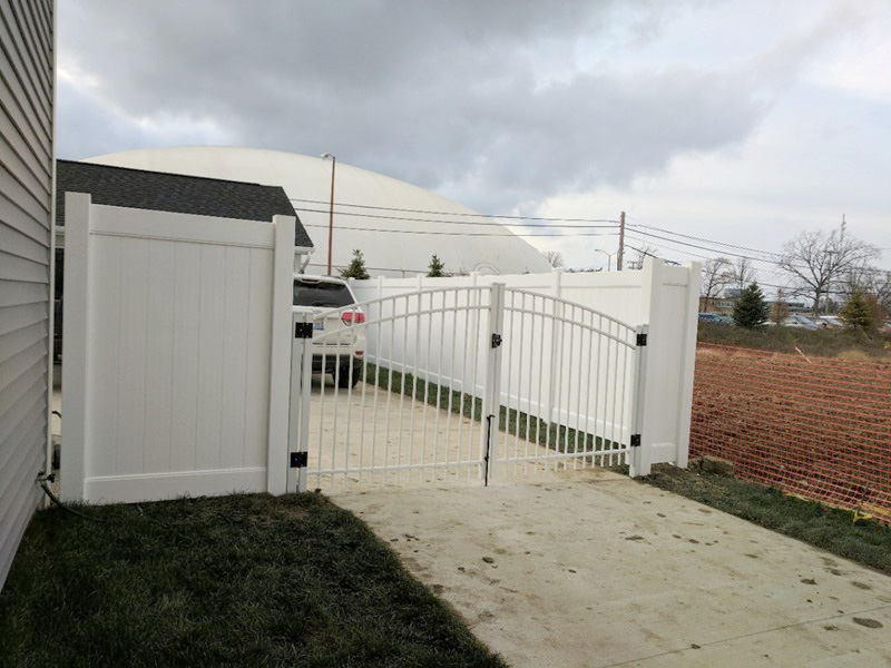 Aluminum gate with privacy fence